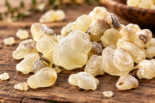 White Hojari Frankincense Resin on Rustic Wood